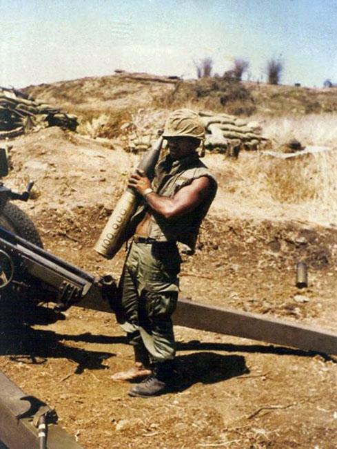Gunner J.B.T. Kerehona holds the 100,000th New Zealand shell fired in Vietnam Gunner J.B.T. Kerehona holds the 100,000th New Zealand shell fired in Vietnam