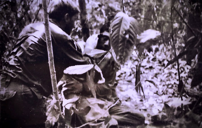 Medic Peter 'Speedy' Jacobs (left) treating Kelly Illolahia, May 1969
