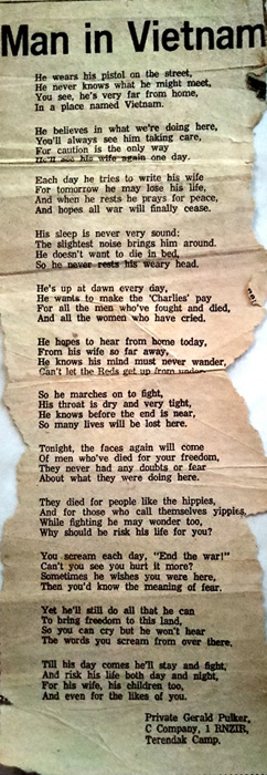 Worn newspaper article with the words of a poem printed on it.