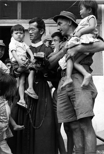 Father Wi and orphans at the An Phong Welfare Centre, 1969