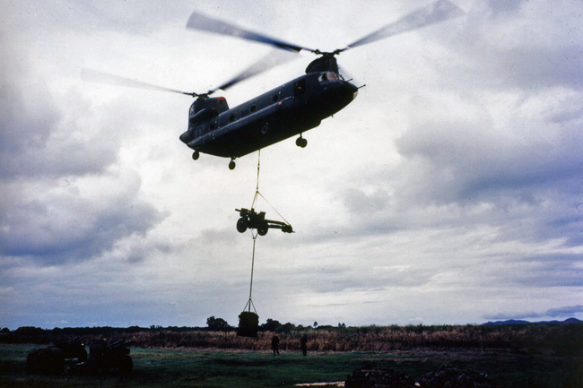 Chinook lifting gun at Nui Dat, circa 1968-1969