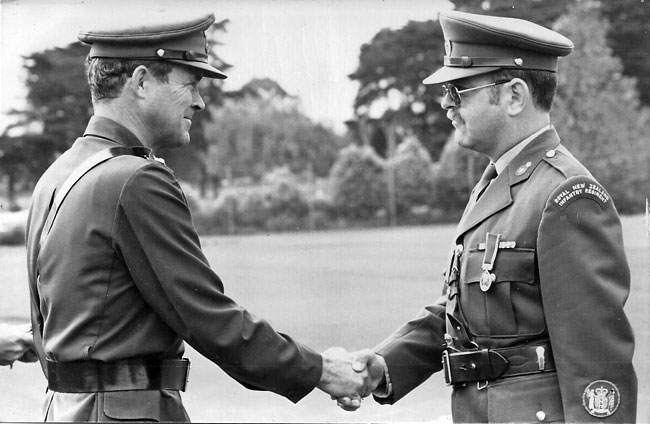 Dudley Young (right) recieves his Long Service & Good Conduct Medal, October 1980