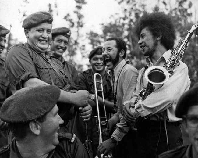Fred Summer and Kevin Rongonui share a joke with New Zealand soldiers at Nui Dat, 1969
