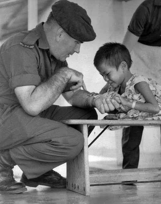 Ken Treanor with Vietnamese orphan in Qui Nhon, 1968