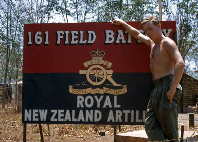 Kevin Burnell next to the 161 Battery sign at Nui Dat