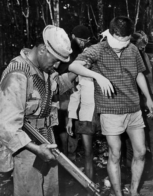 New Zealand soldier with Viet Cong prisoner, 1969 