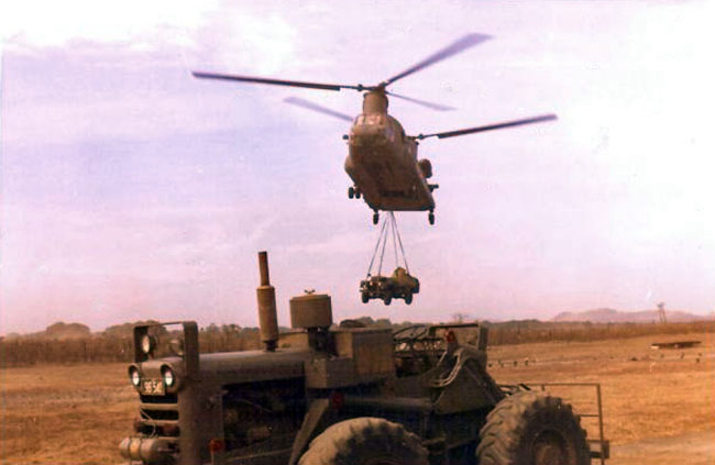 Chinook helicopter returning 161 Battery equipment to Nui Dat, 1971