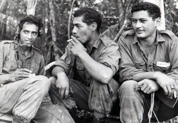 Awaiting a resupply, circa 1967-1968. Left to right: Pat Nuku, Ben Hetaraka, and George Taia Awaiting a resupply, circa 1967-1968. Left to right: Pat Nuku, Ben Hetaraka, and George Taia