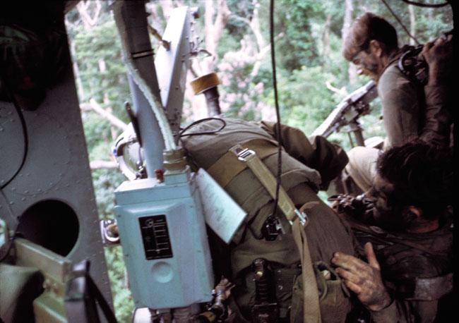 Crew pull a SAS trooper into helicopter Crew pull a SAS trooper into helicopter