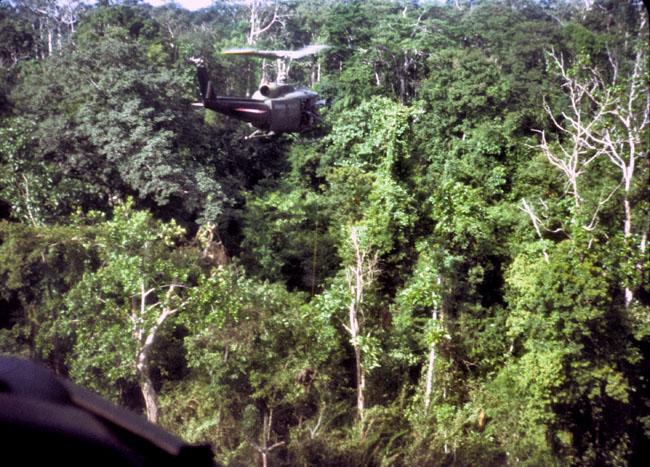 SAS troopers are winched up from the jungle SAS troopers are winched up from the jungle
