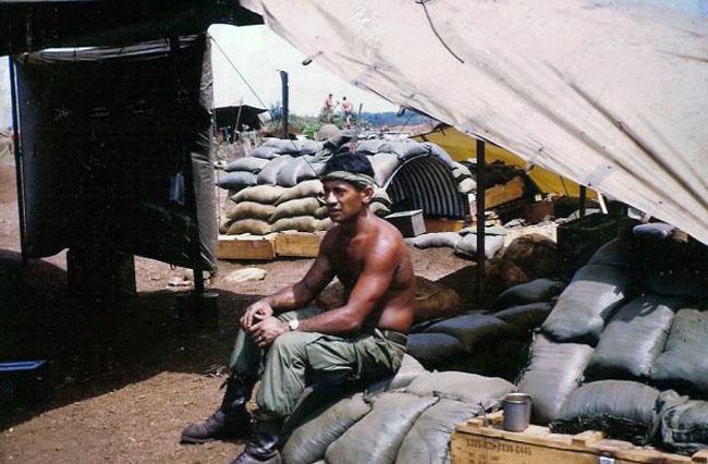 Gunner J.B.T. Kerehona takes a breather in the heat of the day Gunner J.B.T. Kerehona takes a breather in the heat of the day