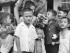 SSgt Graham (Dick) Grigg with Vietnamese orphans