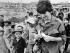 War correspondent Kate Webb at a Vietnamese refugee camp