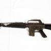 Battle damaged M16 automatic rifle