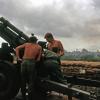 Preparing to fire M101A1 Howitzer, circa 1966-1967