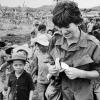 Kate Webb with Vietnamese refugees