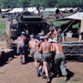 Loading gun into APC, 1966