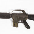Battle damaged M16 automatic rifle