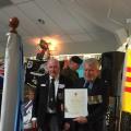 Wayne Lindsay receiving RNZRSA certificate from Robert 'Bukit' Hill