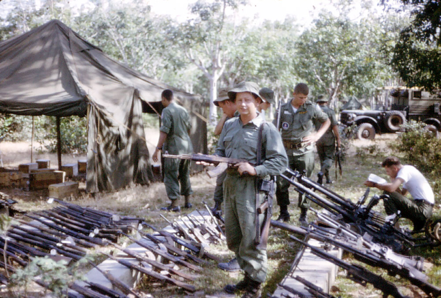 Bdr Val Litchfield holding captured AK47 rifle
